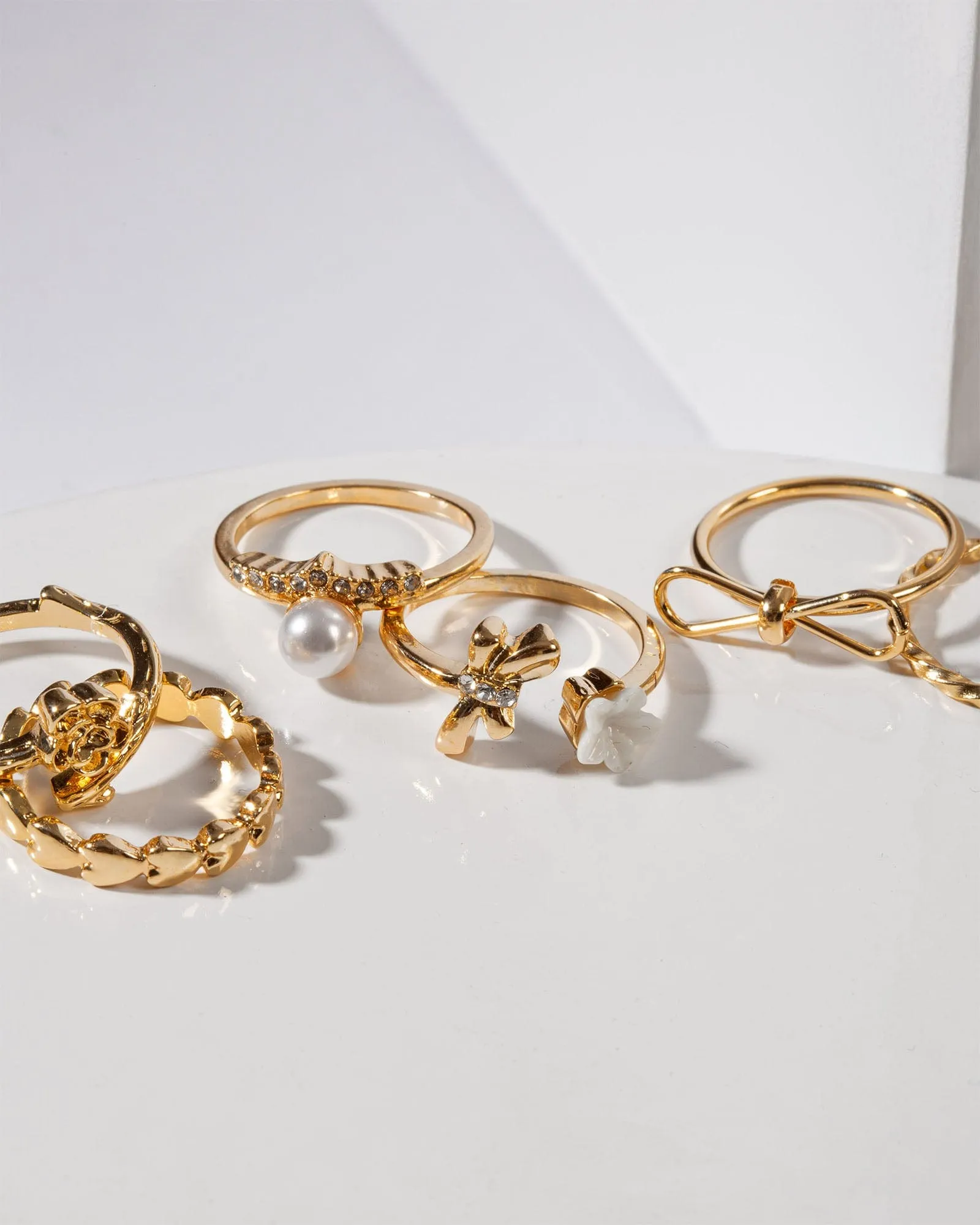 Gold Multi Pack Flower And Bow Rings