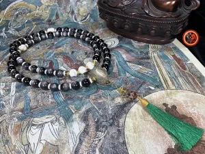 Mala artisanal- 54 perles d'obsidiennes argentées.