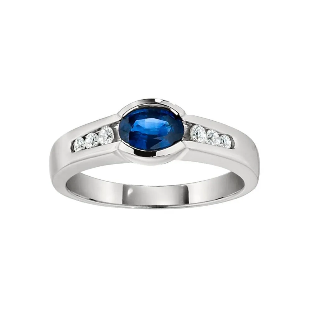 Modern Bypass Emerald and Diamond Ring