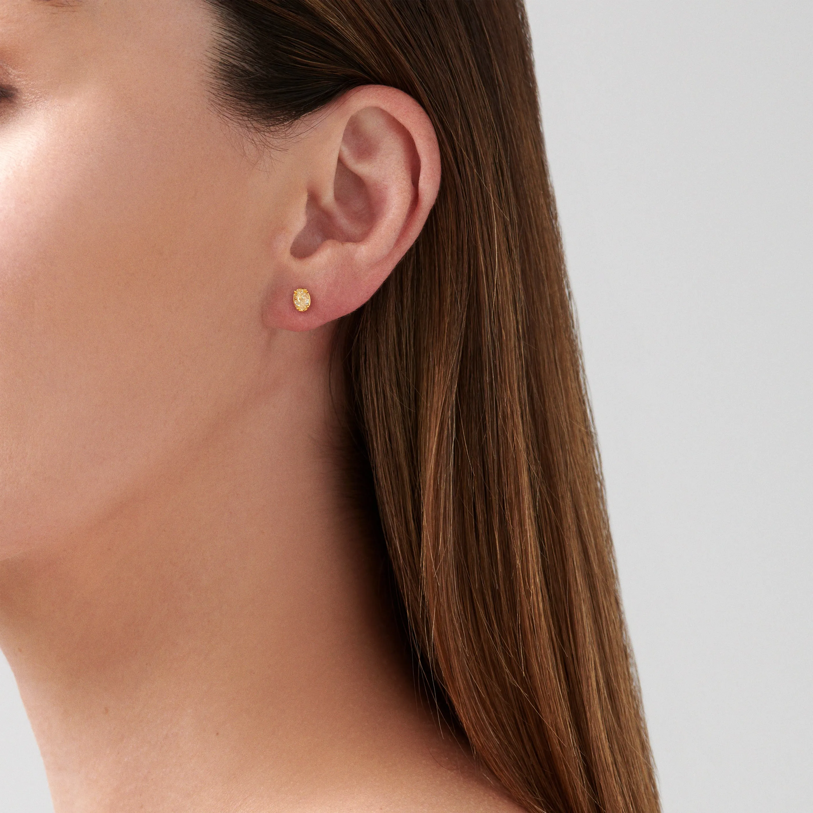 Riviera Oval Shaped Fancy Yellow Diamond Studs | 18K Yellow Gold
